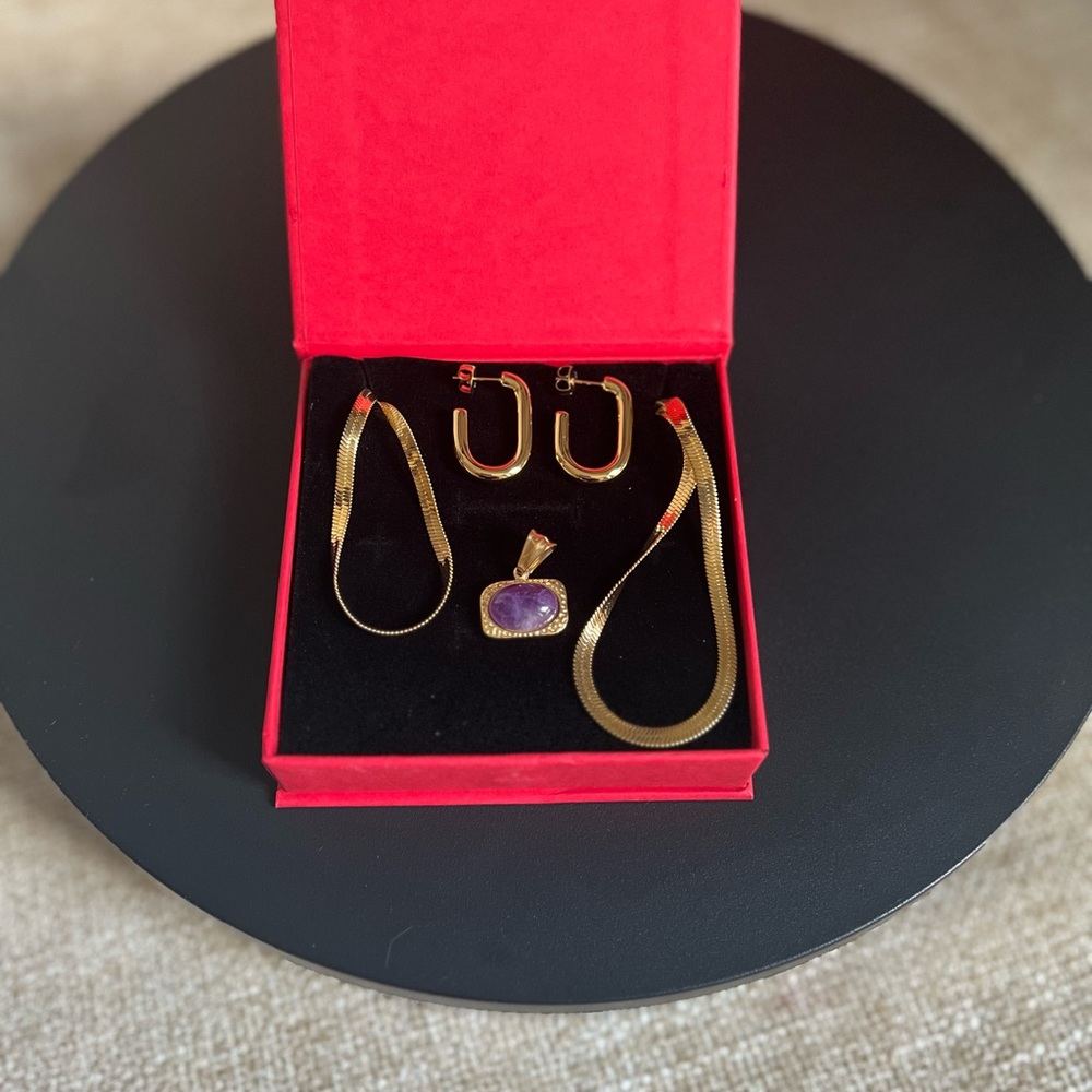 New Savvy Cie 4pc set - 18k yellow gold over stainless steel.